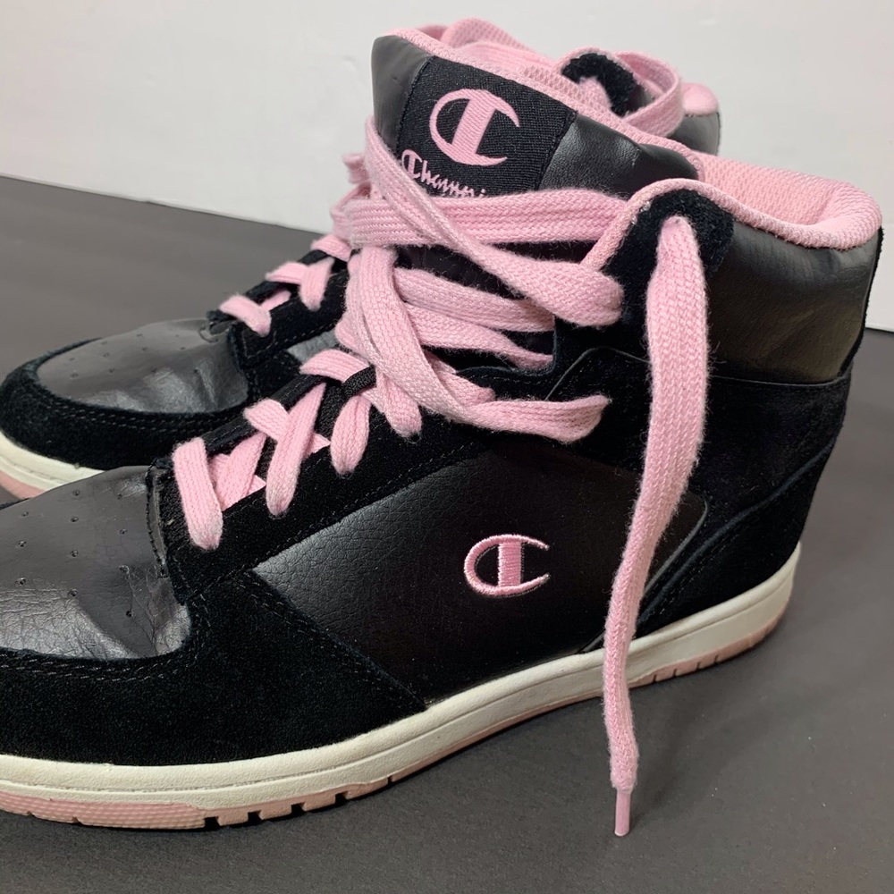 Black on black high tops with pale pink logo/trim